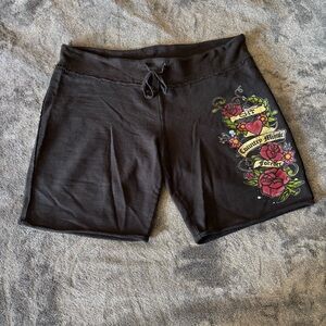 CMT Loot black & red floral design raw edge sweat shorts